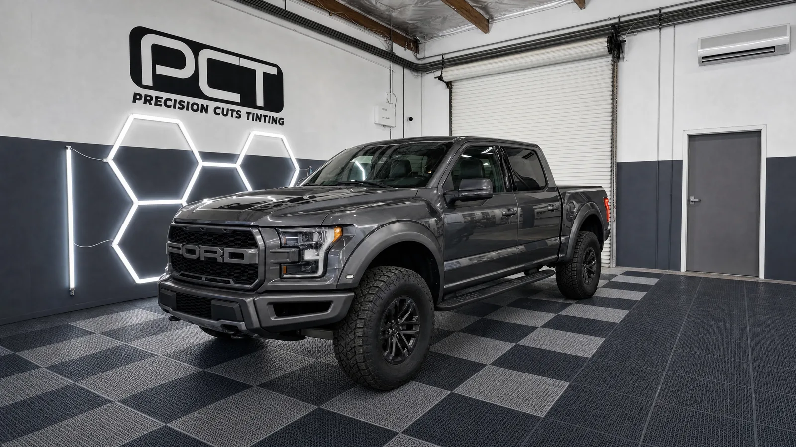 A Ford F-150 Raptor with tinted rear glass in our studio