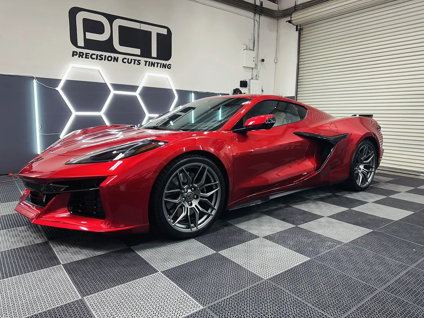 A red Chevrolet Corvette Z06 we tinted, from the front